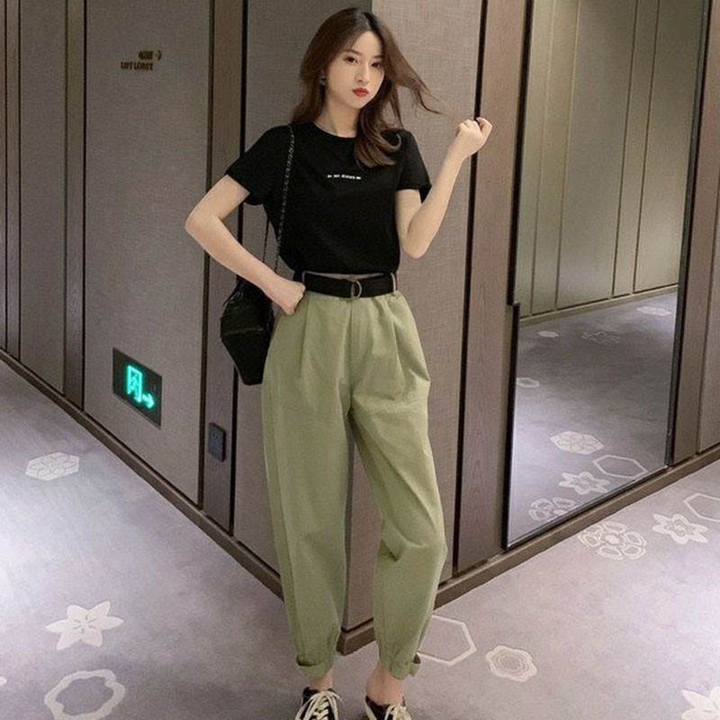 black t shirt green pants