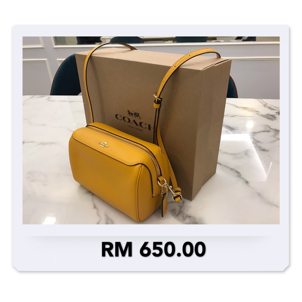 coach yellow sling bag