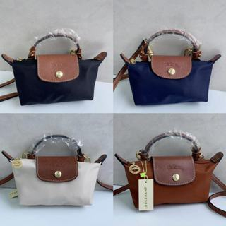 WITH STRAP Ready stock from My Highest quality Genuine leather LC Mini Bag Handbag Designer Cross-body Bag Dumplings Handbags