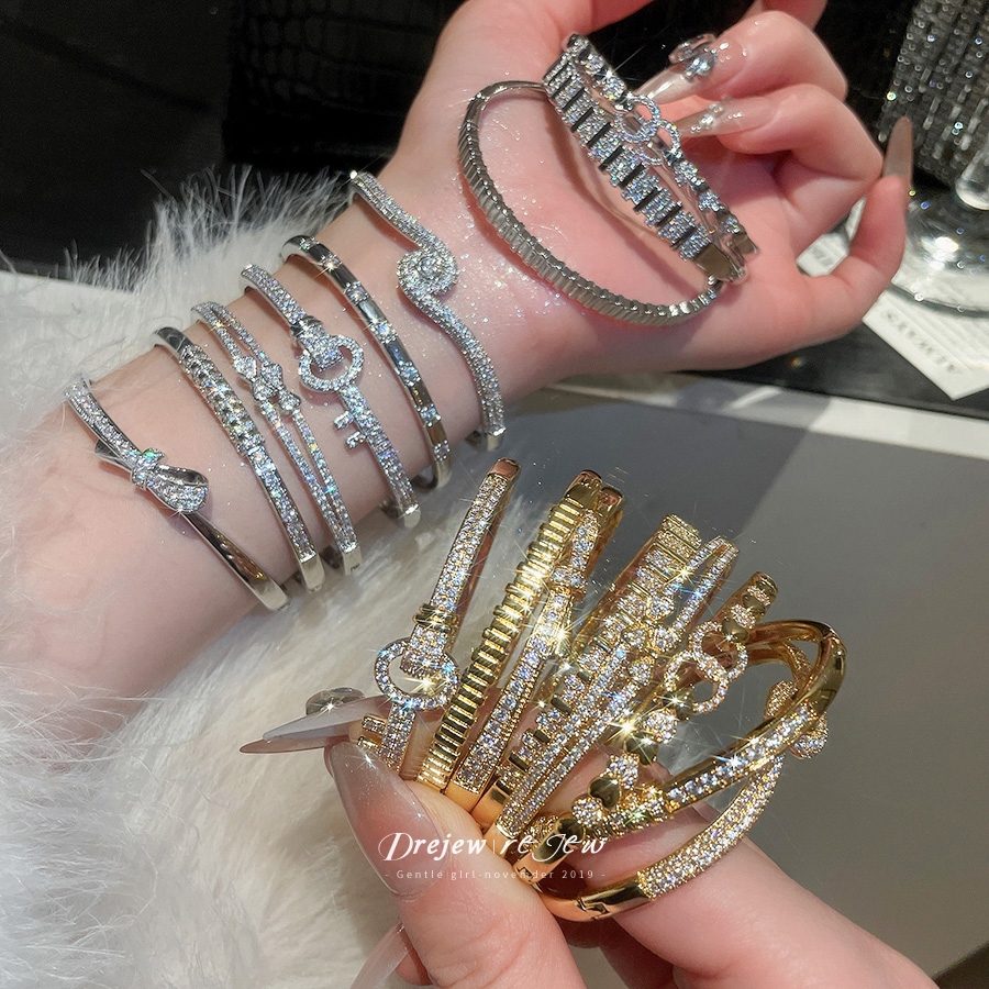 Drejew Cubic Zirconia Bracelet Set Women’s Gold & Silver-Tone Statement Bracelets with Key, Bow, and Spiral Accents Fashion Glamorous Jewelry Gift