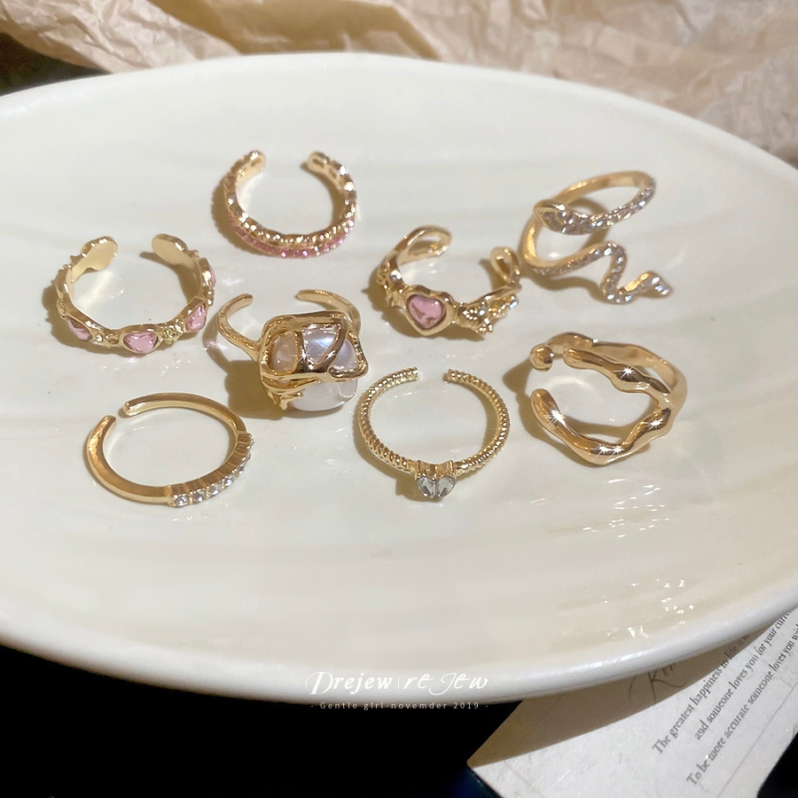 DREJEW 8pcs Gold Stackable Ring Set - Snake Heart Star Crystal Rings Trendy Women’s Fashion Ring