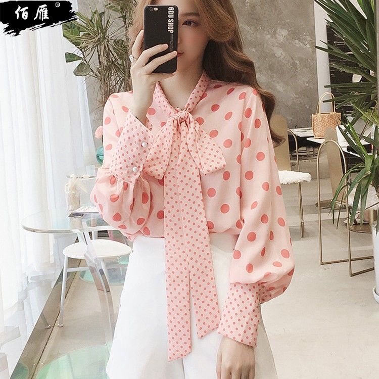pink polka dot blouse