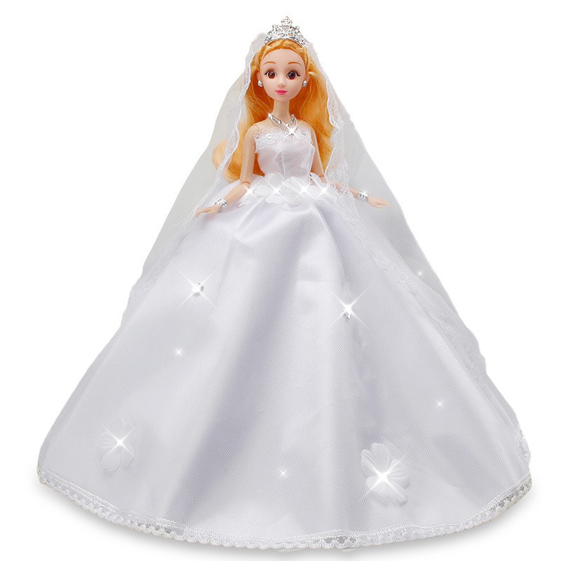 barbie doll in white dress