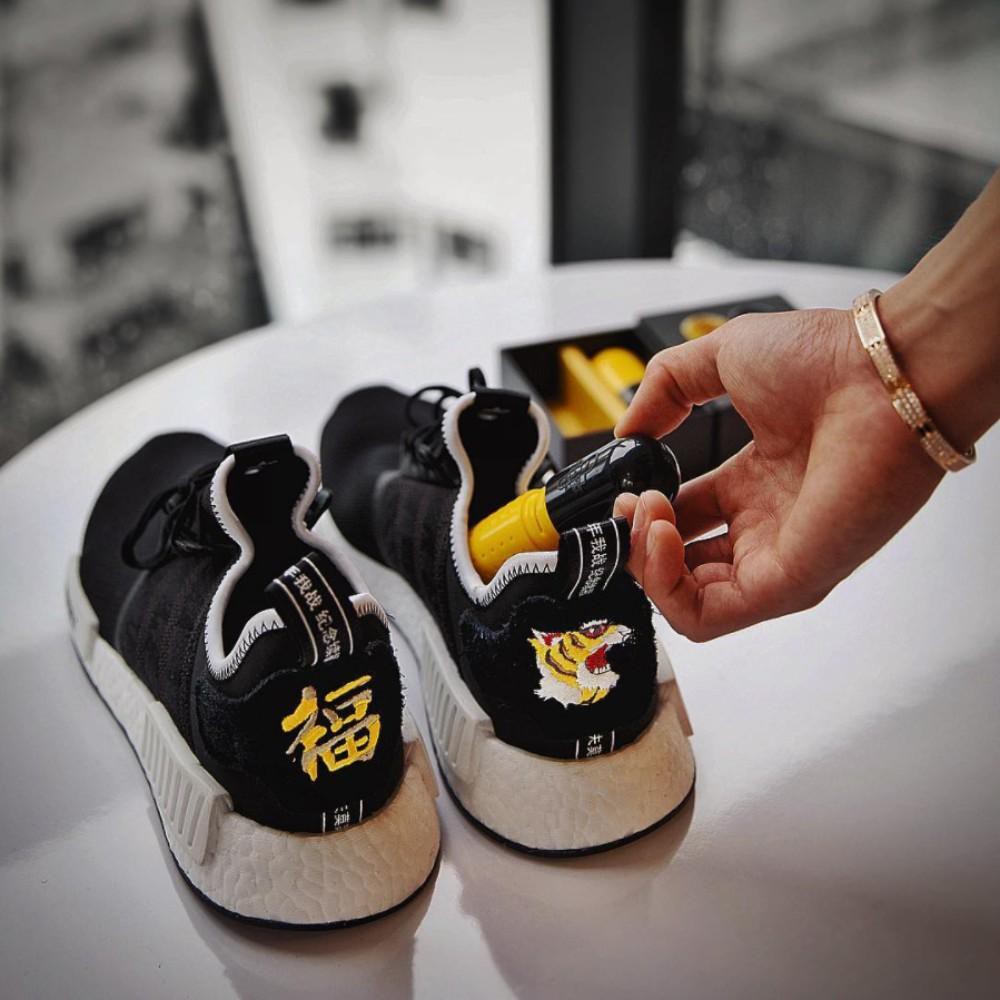 nmd x invincible x neighbourhood