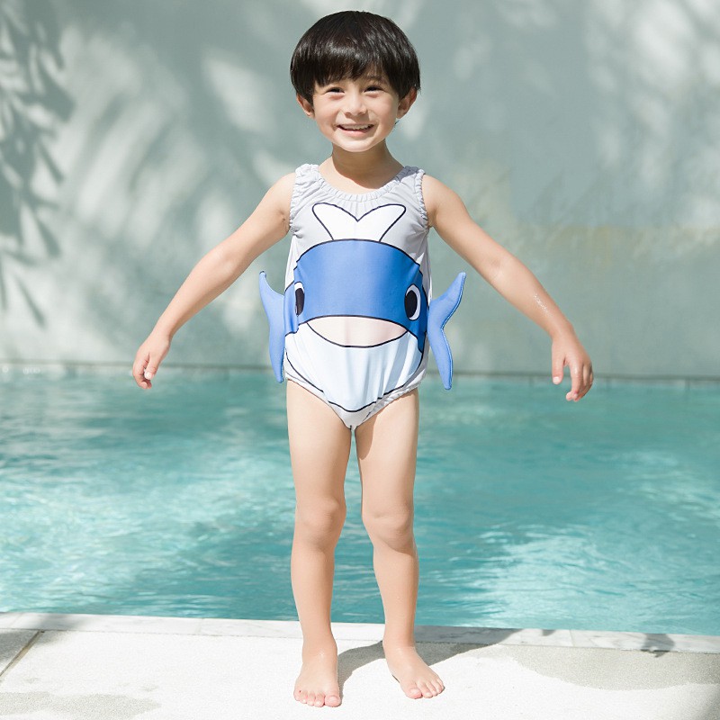 boy in girl's one piece swimsuit
