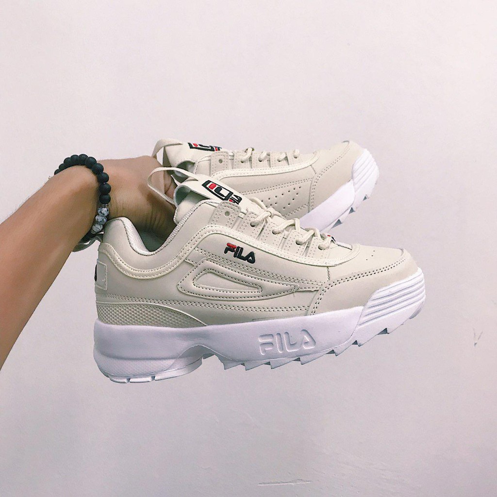 cream fila disruptor