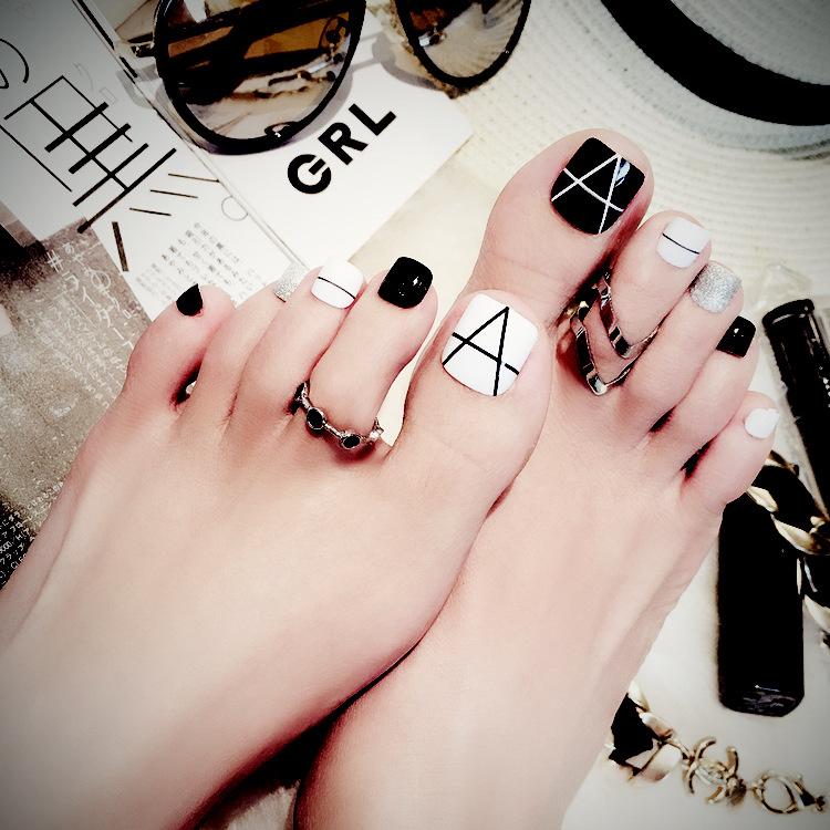 silver and black toenails