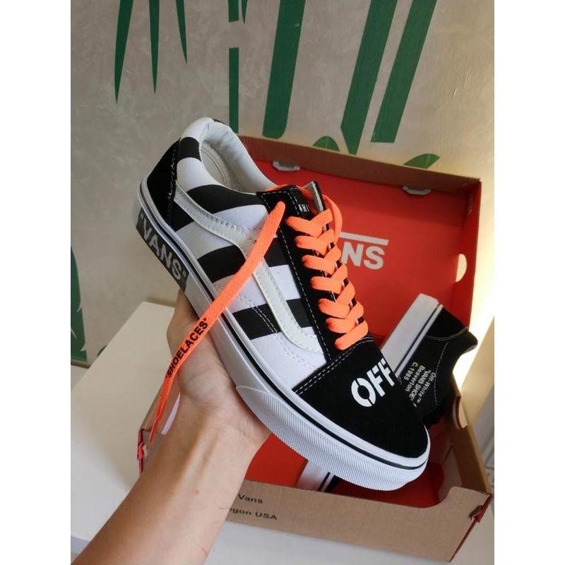 orange and white vans