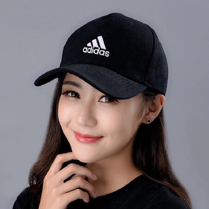 girl with adidas cap