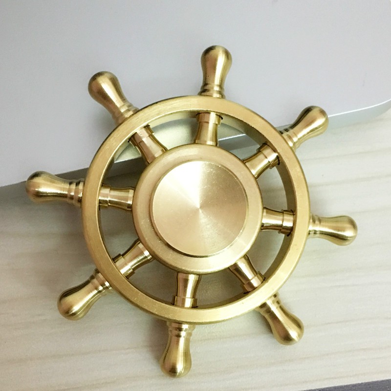 brass finger spinner