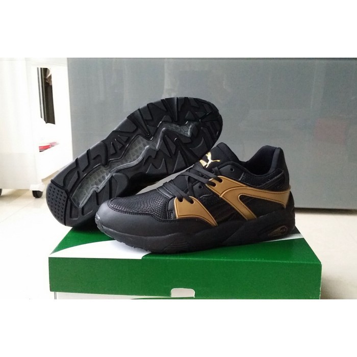 puma trinomic black and gold