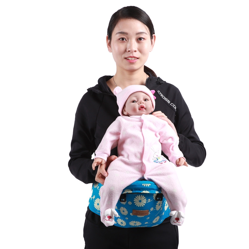 baby holding bag