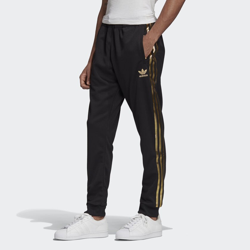 adidas track pants gold stripes