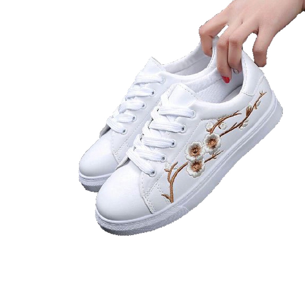 white sneakers with flowers