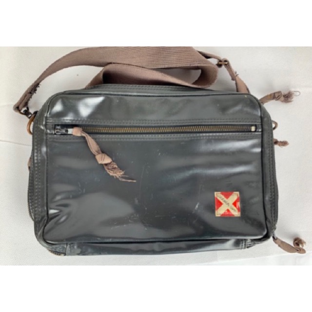 luggage label sling bag
