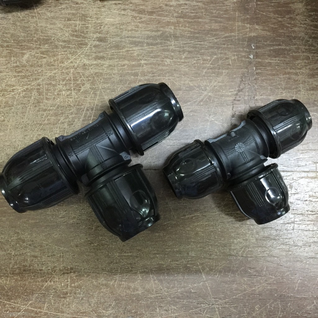 Two poly pipe fittings