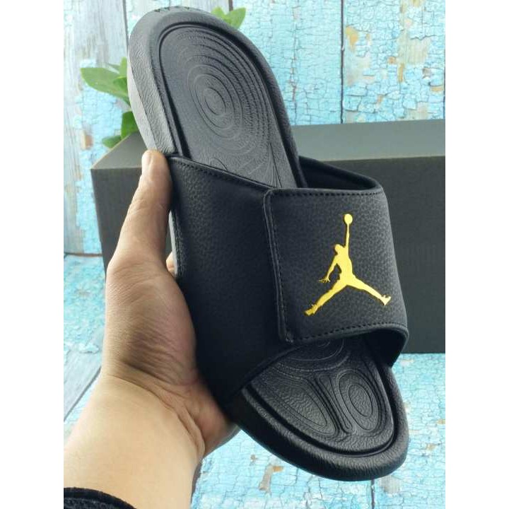 jordan hydro 6 slides black and gold