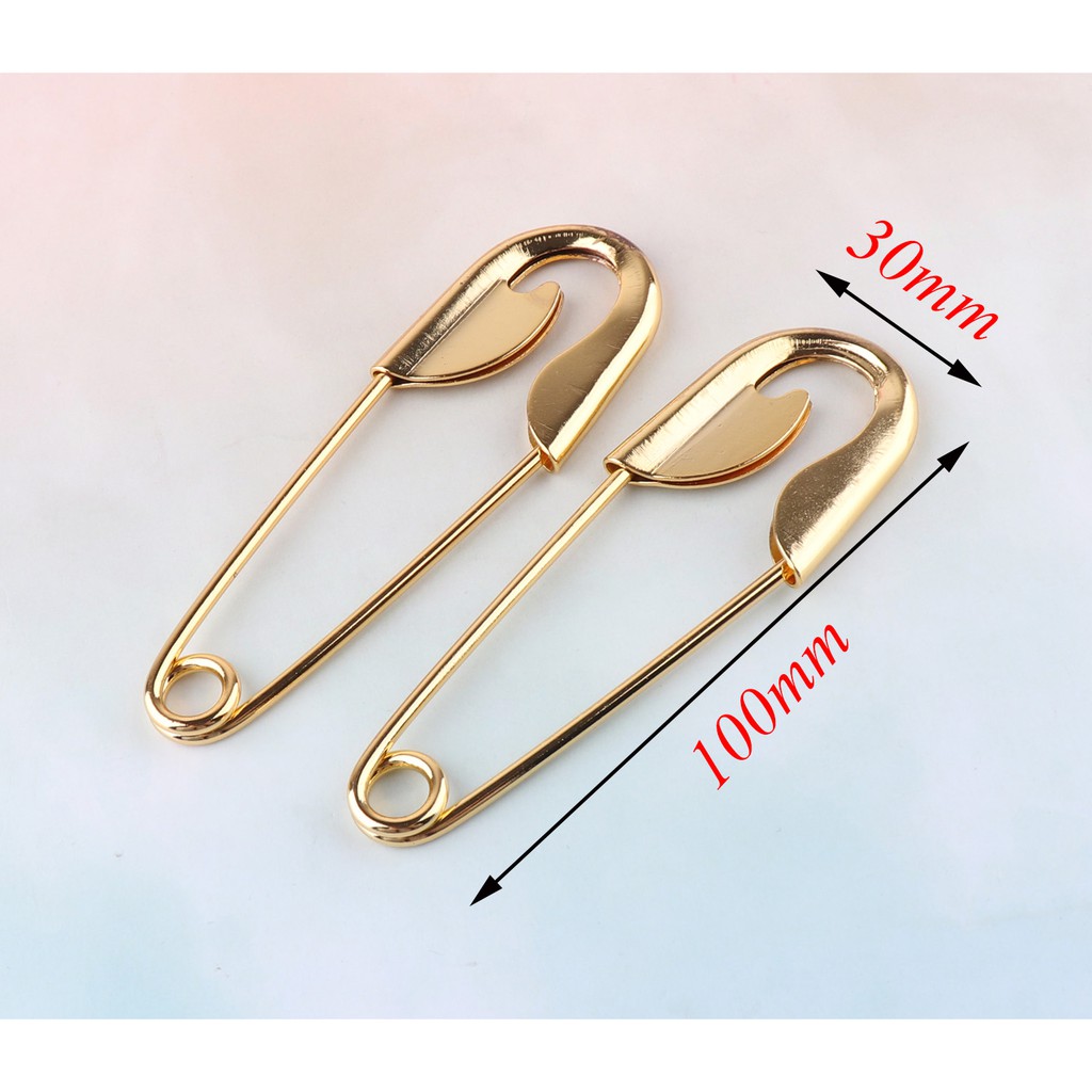 large gold safety pins