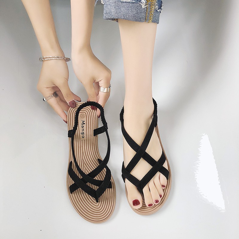 black strappy flat shoes