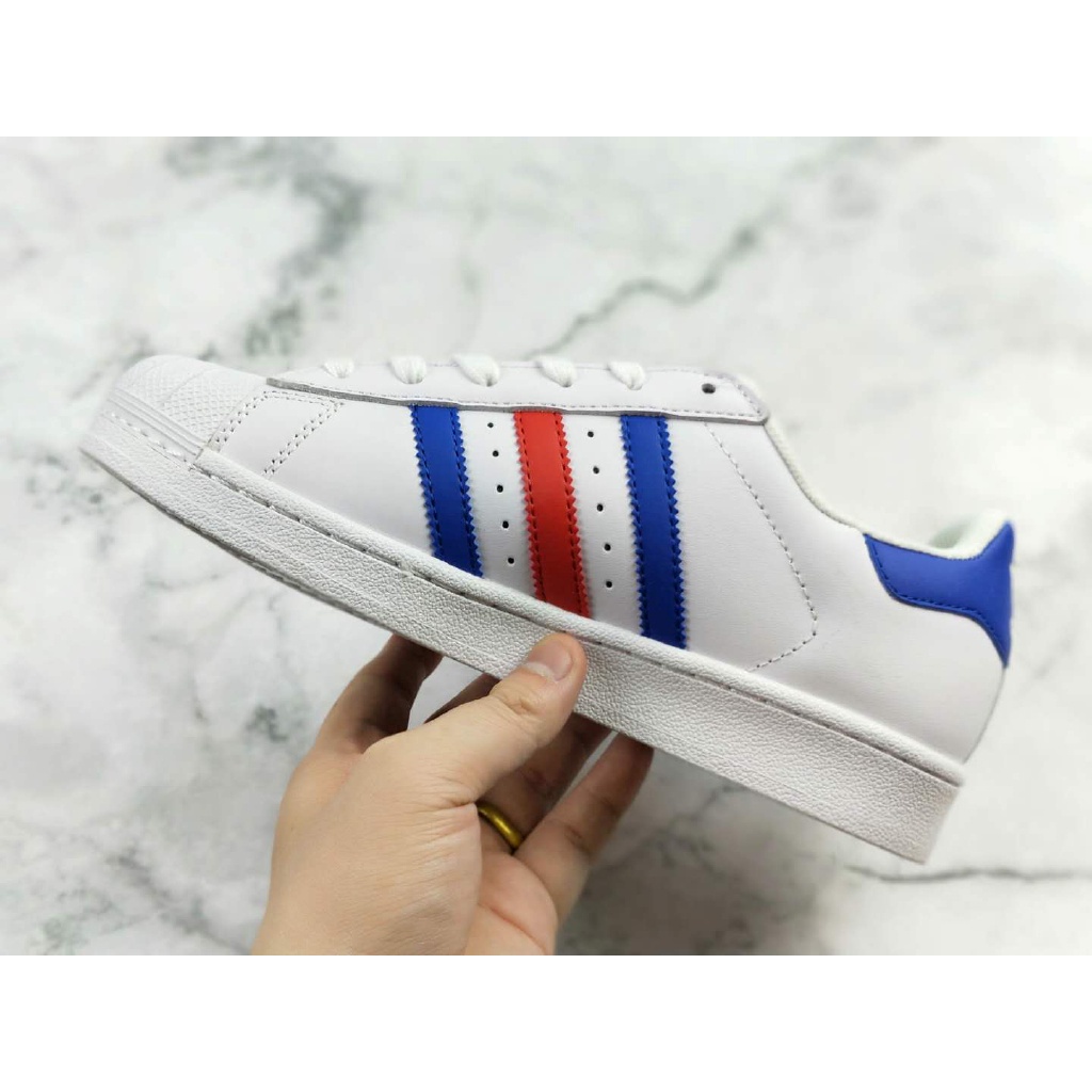 white shell head adidas