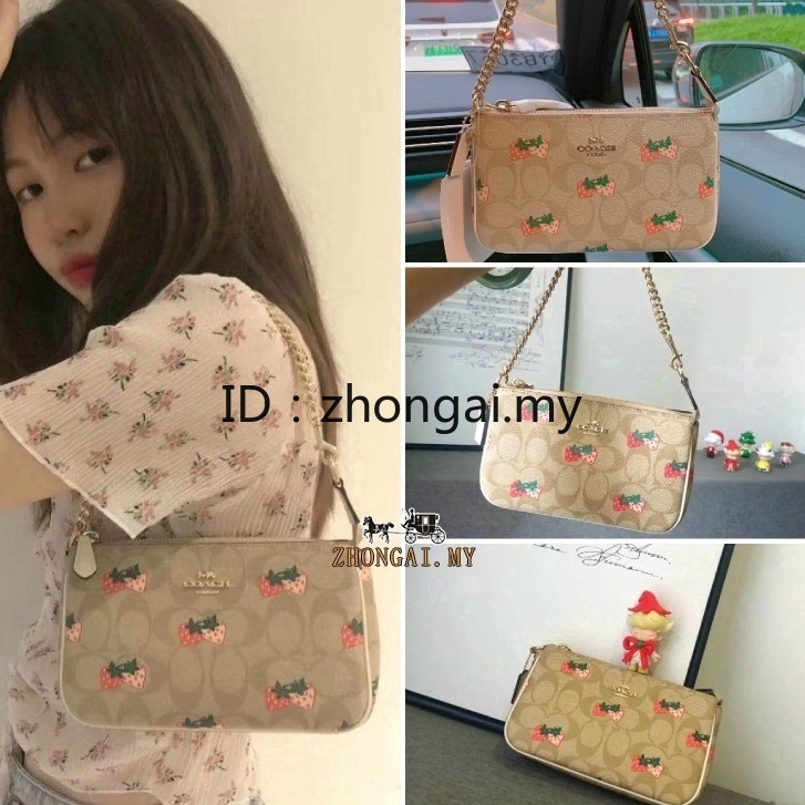 strawberry coach purse