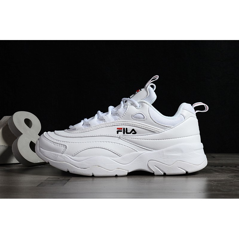 famous footwear fila disruptor