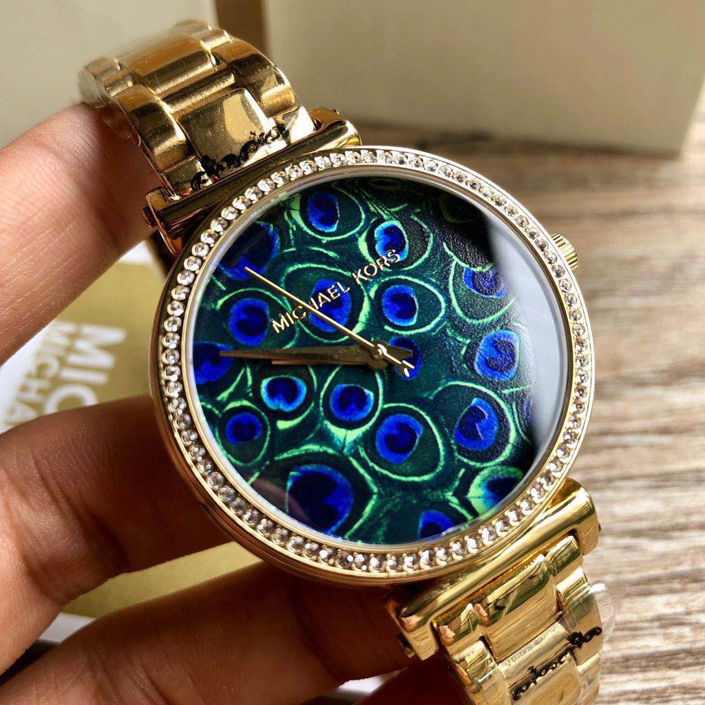 mk peacock watch