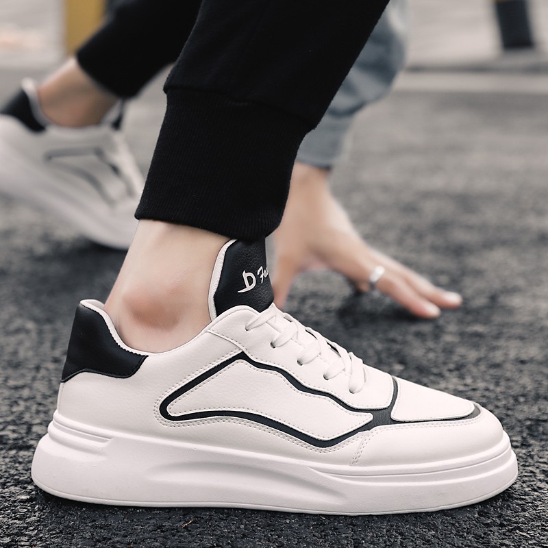 white shoes with black stripes