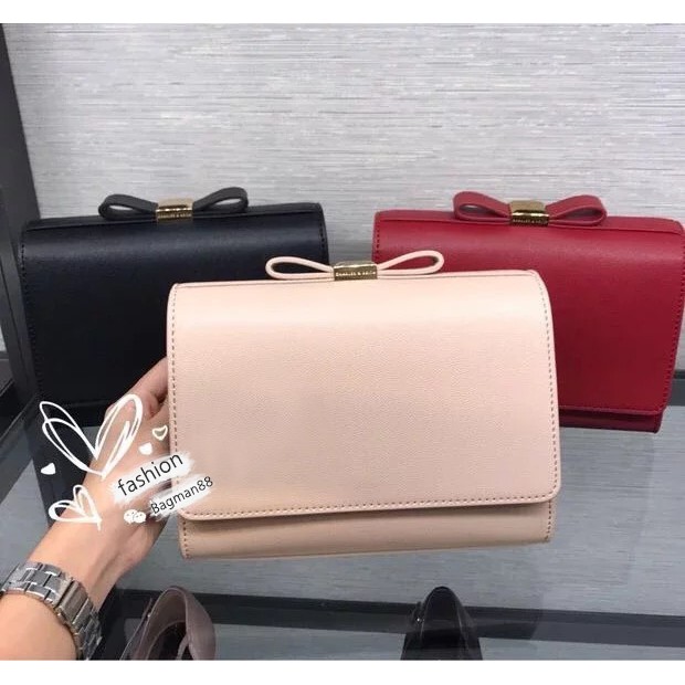 charles and keith bow detail clutch