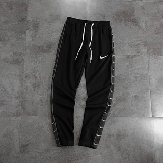 nike sportswear swoosh woven pants