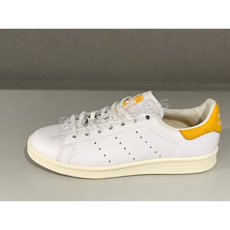 white and yellow stan smith
