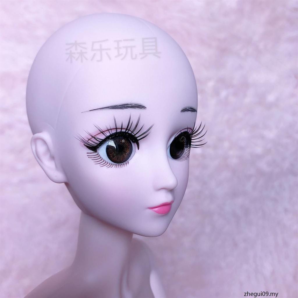 bald head barbie doll