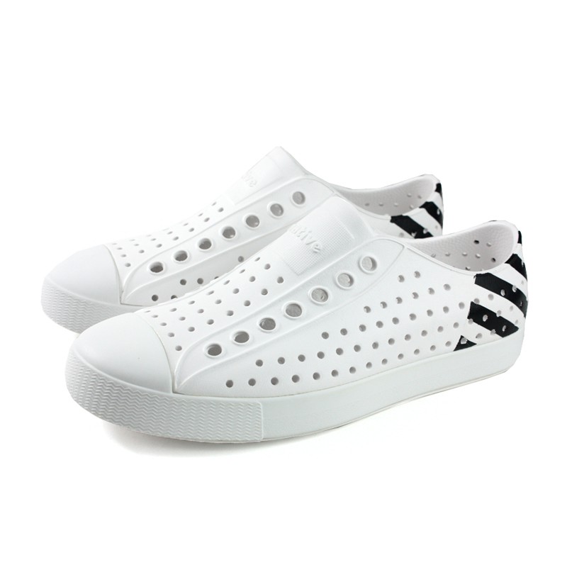 black crocs with white stripe