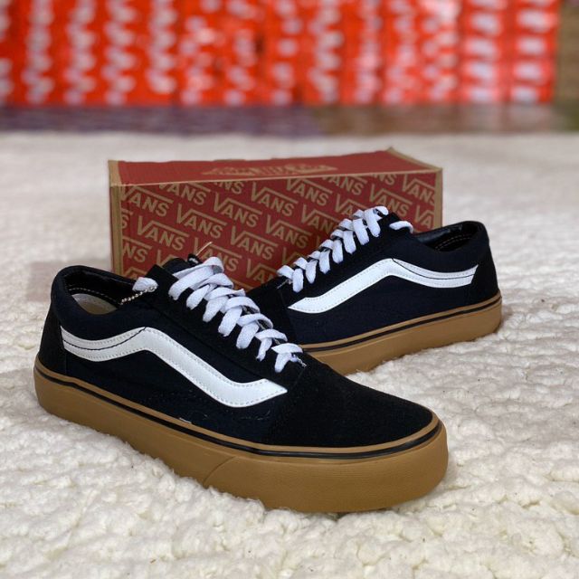 black old skool vans with gum sole