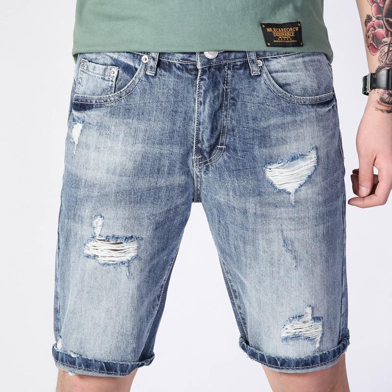 torn short jeans