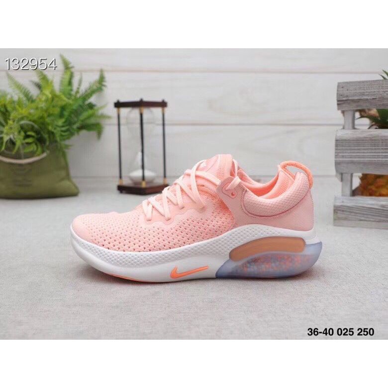 peach color nike shoes