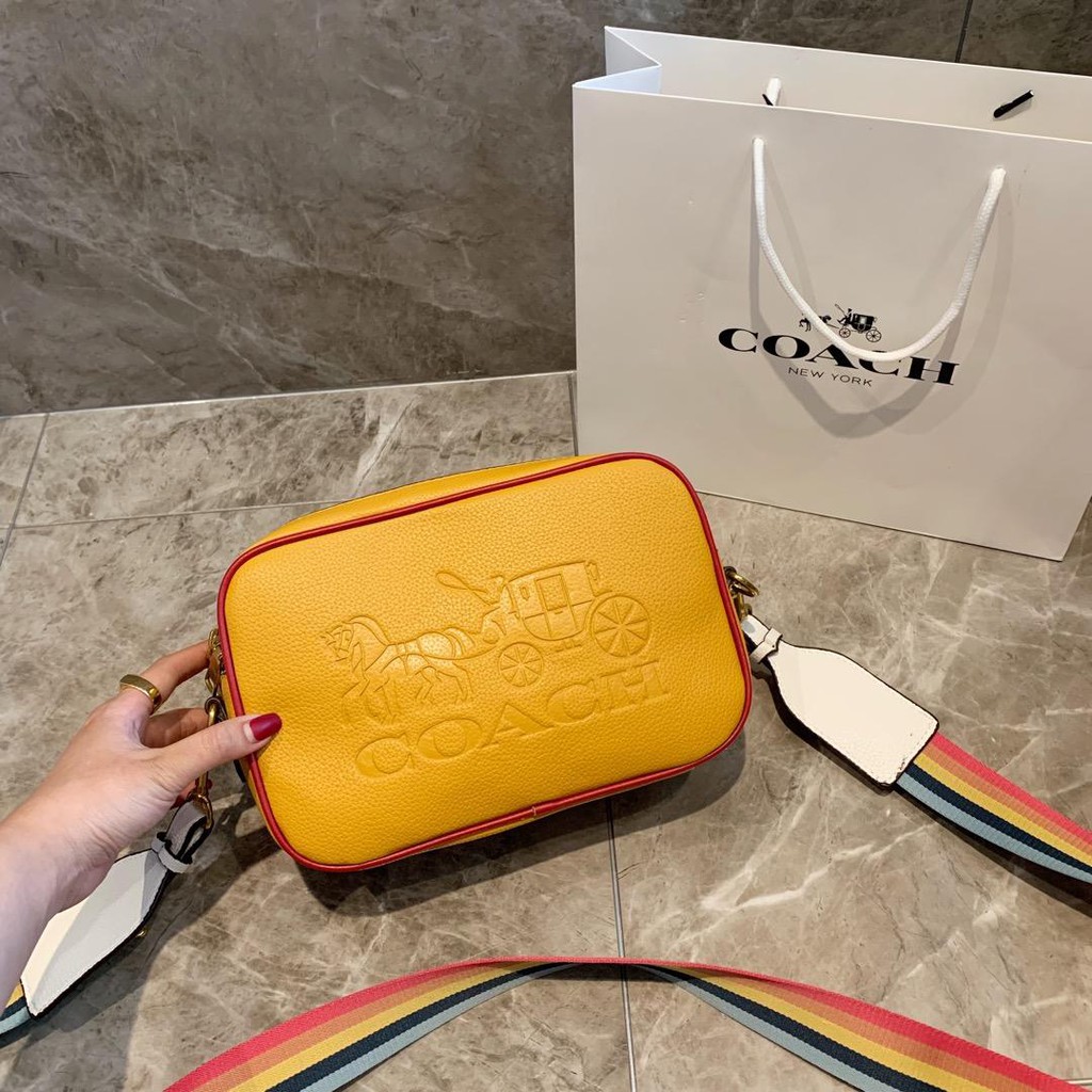 coach yellow sling bag