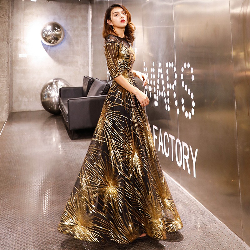 black and gold sequin gown