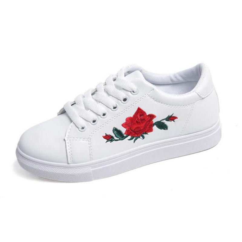 white sneakers with flowers