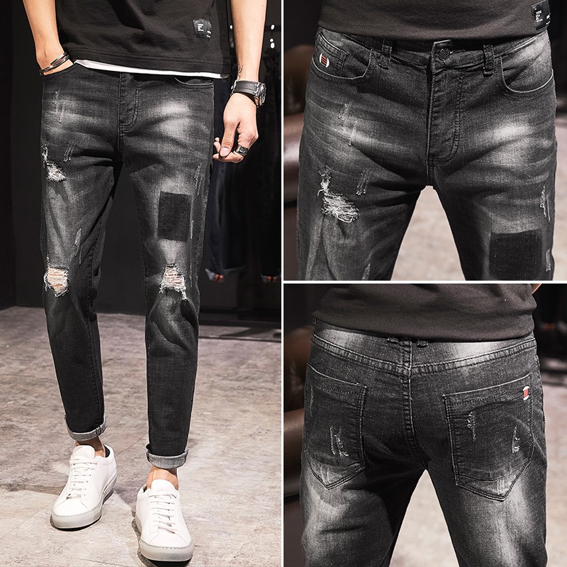 black torn jeans