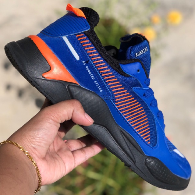 blue and orange puma shoes