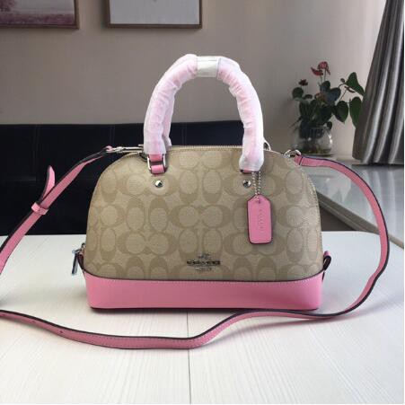 coach pink sling bag