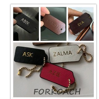 coach bag tag