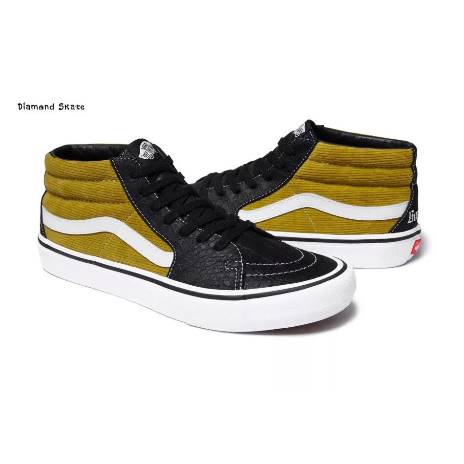 black and yellow high top vans