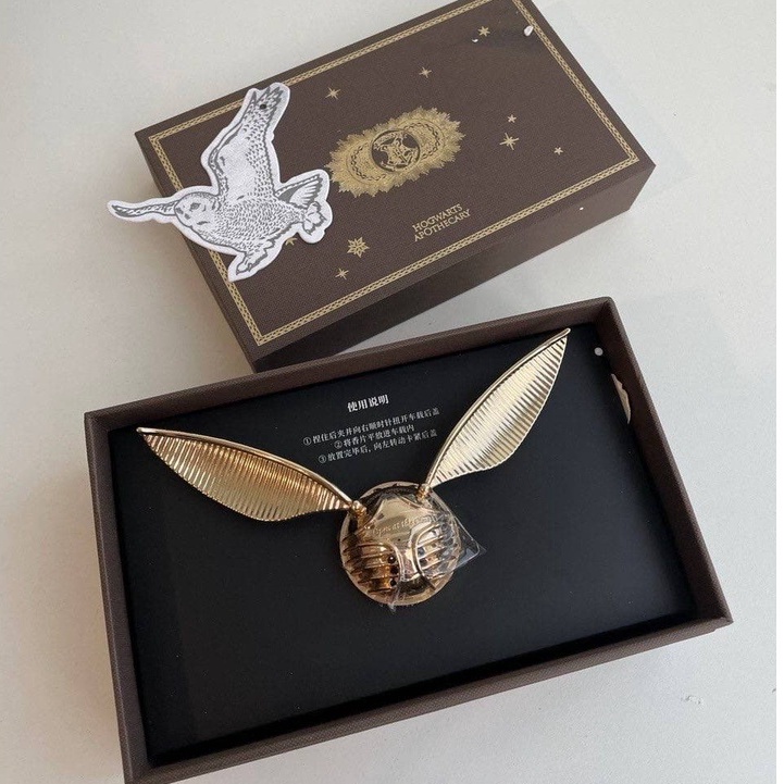 HARRY POTTER HOGWART APOTHECARY GOLDEN SNITCH CAR AIR FRESHENER [woody
