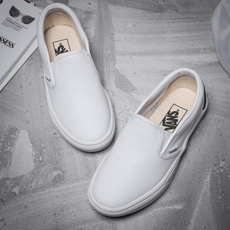 white leather slip ons