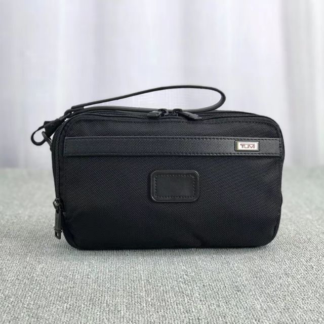 tumi men's clutch