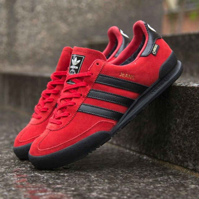 red and black adidas jeans