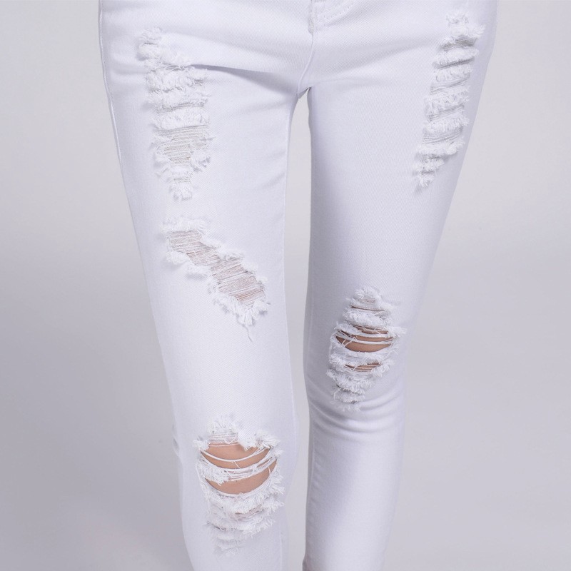 ladies white ripped jeans