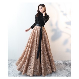 black and gold gown with sleeves